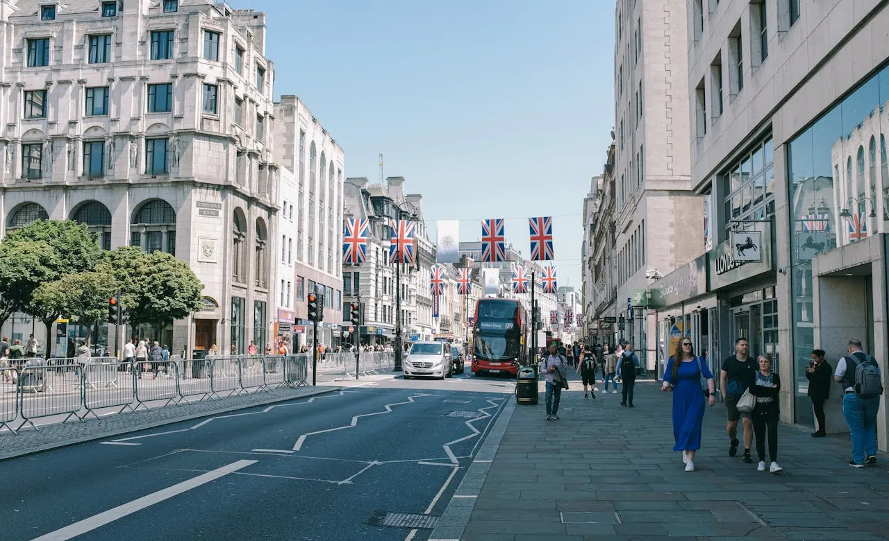 London street with taxis and city traffic