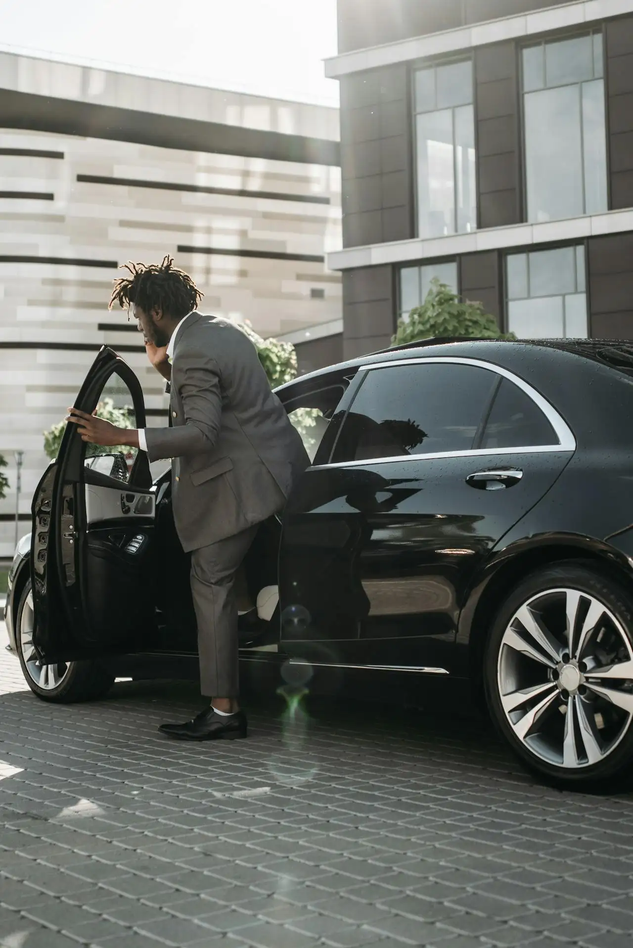 Business traveller using daily chauffeur service between meetings